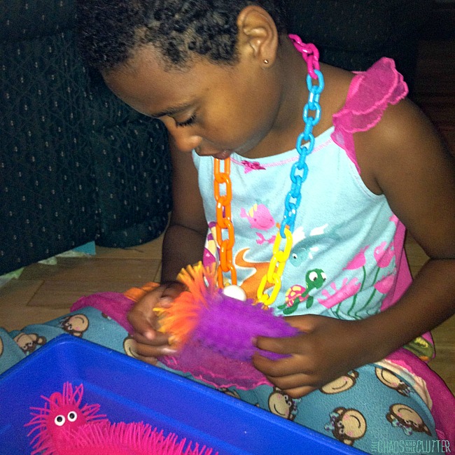 playing with a monster sensory bin
