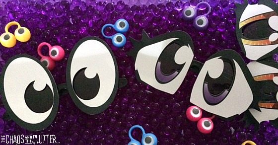 Eyeball sensory bin with purple water beads