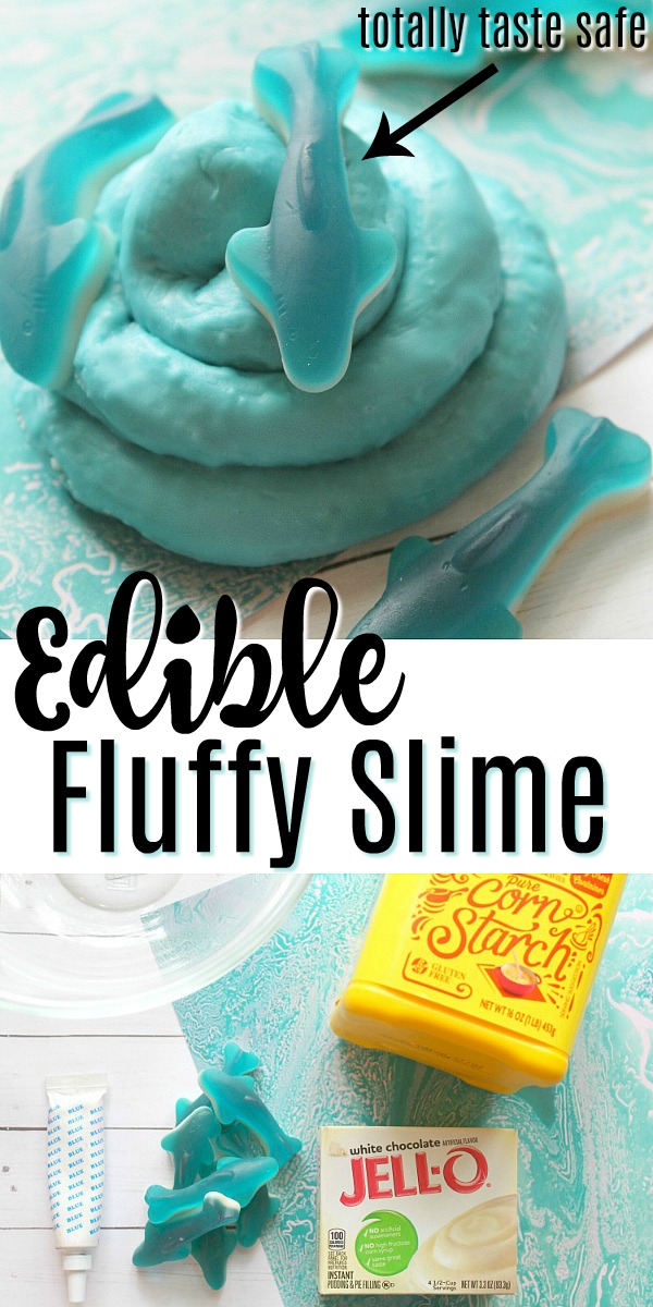a pale blue slime sits in a swirl on a blue and white surface. A blue gummy shark candy is on top. There is an arrow pointing to the shark that says "totally taste safe". The text reads "Edible Fluffy Slime". There is a box of jello, shark candies, corn starch, and an empty bowl at the bottom.