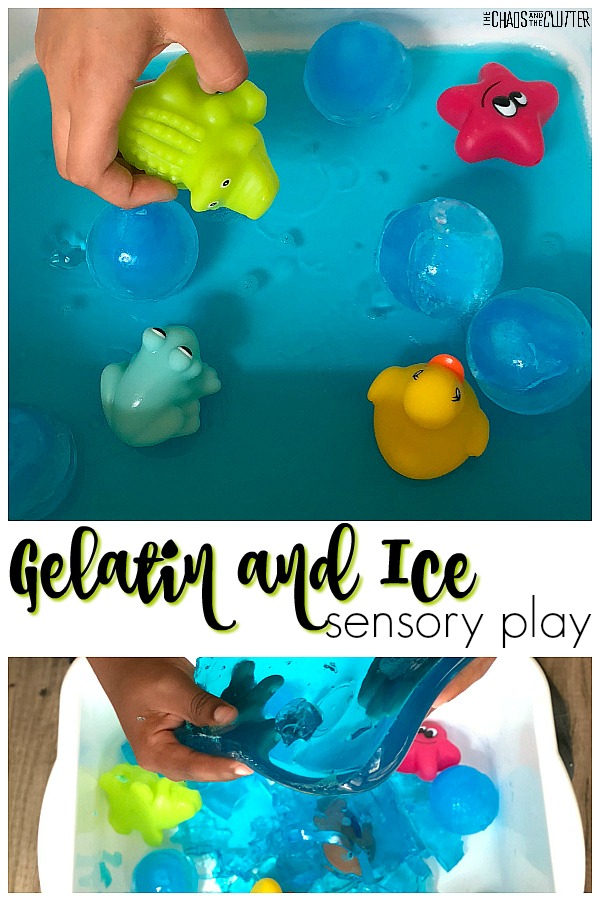 a child's hand holds a small bath toy above a white plastic bin filled with blue gelatin and balls of blue ice with other brightly coloured bath toys sitting on top of the jello. The text reads "Gelatin and Ice sensory play"
