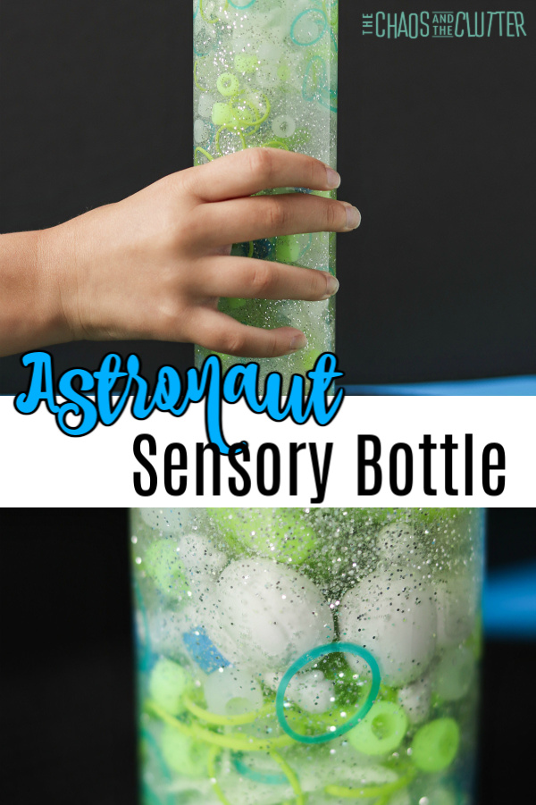hand holds a bottle filled with liquid, glitter, and beads with text that reads "Astronaut Sensory Bottle"