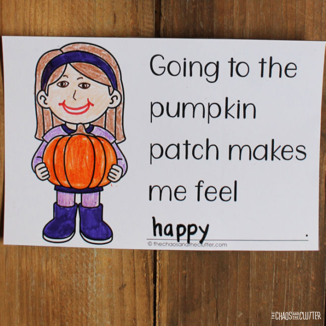 colouring page of girl holding a pumpkin