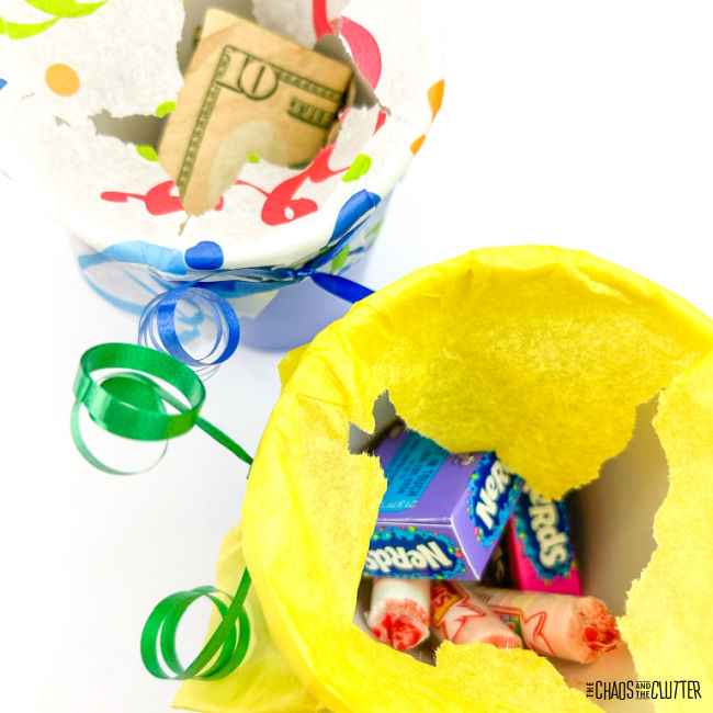 cups with money and candy in them